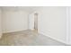 Spacious bedroom with neutral carpeting and trim, ready for customization at 12097 E Mexico Ave, Aurora, CO 80012
