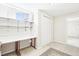 Bedroom featuring shelving and a closet; ideal for storage and organization at 12097 E Mexico Ave, Aurora, CO 80012