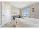 Bedroom with carpet, desk by the window, and natural light at 5654 N Emporia St, Denver, CO 80238