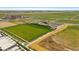 A beautiful aerial view of a park with green space, an amphitheater, and parking at 1181 W 170Th Ave, Broomfield, CO 80023