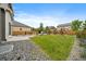 Spacious backyard with lush green grass and a wooden fence, perfect for outdoor activities and Gathering gatherings at 1181 W 170Th Ave, Broomfield, CO 80023