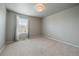 Comfortable bedroom with a bright window and plush carpet at 1181 W 170Th Ave, Broomfield, CO 80023