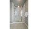 Modern glass enclosed shower stall with tiled walls and chrome fixtures at 1181 W 170Th Ave, Broomfield, CO 80023