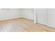 Bedroom with closet, hardwood floors, white walls and trim for a modern look at 2505 Upham St, Lakewood, CO 80214
