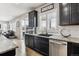 Well-appointed kitchen featuring stainless steel appliances, granite counters, and ample cabinet space at 7301 S Shady Grove Way, Aurora, CO 80016