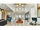 Bright and inviting lobby area with modern furnishings and soaring ceilings at 7301 S Shady Grove Way, Aurora, CO 80016