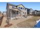 Spacious backyard features a patio, fenced yard, and gravel area; great outdoor living at 7258 Oasis Dr, Castle Rock, CO 80108