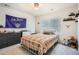 Bright bedroom with ample natural light, a decorative flag, and comfortable furnishings at 7258 Oasis Dr, Castle Rock, CO 80108