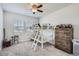 Cozy bedroom with a bunk bed, a dresser, and plenty of space for play and storage at 7258 Oasis Dr, Castle Rock, CO 80108