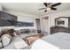 Inviting main bedroom showcasing a comfortable seating area, a large painting, and tasteful furnishings at 7258 Oasis Dr, Castle Rock, CO 80108