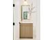 Charming powder room featuring a mirror, natural wood vanity, and modern lighting fixture at 2773 S Garfield St, Denver, CO 80210