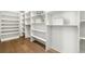 Large walk-in closet with ample shelving and hanging space at 2599 Heron Lakes Pkwy, Berthoud, CO 80513