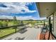 Outdoor deck with scenic views, seating and grill at 7614 Malamute Dr, Evergreen, CO 80439
