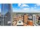 Sweeping city view highlighting Denver's landscape and distant mountain views on a clear day at 1020 15Th St # 13K, Denver, CO 80202