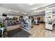 Spacious gym offering various exercise machines, free weights, and mirrored walls for a complete workout experience at 1020 15Th St # 13K, Denver, CO 80202