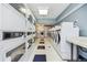 Clean laundry room offering modern appliances with several washers and dryers available for residents' use at 1020 15Th St # 13K, Denver, CO 80202