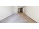 Inviting living room featuring plush carpeting and a view to the kitchen and dining area at 1020 15Th St # 13K, Denver, CO 80202