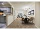 Updated living room with new carpet, updated appliances, and eat in dining area at 1020 15Th St # 13K, Denver, CO 80202