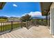 Outdoor deck featuring wood railings and scenic views of the mountains in the background at 16710 Vincent Ave, Monument, CO 80132