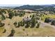 Aerial view showcases the house situated within a picturesque neighborhood at 386 Monte Vista Rd, Golden, CO 80401
