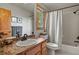Bathroom features wood vanity and shower with tub at 386 Monte Vista Rd, Golden, CO 80401