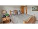 Bedroom boasts wood furnishings, soft lighting, and a peaceful ambiance at 386 Monte Vista Rd, Golden, CO 80401