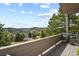 Outdoor deck with scenic views and outdoor dining area at 386 Monte Vista Rd, Golden, CO 80401