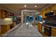 Kitchen boasts a large island, stainless appliances, and wood floors at 386 Monte Vista Rd, Golden, CO 80401