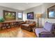 Comfortable living room features hardwood floors, built-in shelves and ample seating at 386 Monte Vista Rd, Golden, CO 80401