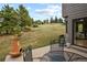 Relaxing patio with an outdoor fireplace and mountain views at 386 Monte Vista Rd, Golden, CO 80401