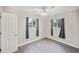 Cozy bedroom with hardwood floors and natural light at 6104 Hudson St, Commerce City, CO 80022