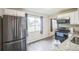 Modern kitchen with stainless steel appliances and granite countertops at 6104 Hudson St, Commerce City, CO 80022