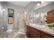 Bathroom featuring a glass shower enclosure, a vanity, and neutral colors at 1055 Divide View Dr, Golden, CO 80403