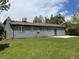 Home exterior highlighting the backyard, patio, and landscaping at 7054 Welch Ct, Arvada, CO 80004