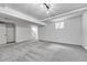Spacious finished basement with carpeted floors and recessed lighting at 264 S Newark Cir, Aurora, CO 80012