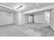 Spacious finished basement with carpeted floors and recessed lighting at 264 S Newark Cir, Aurora, CO 80012