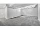 Spacious finished basement with carpeted floors and recessed lighting at 264 S Newark Cir, Aurora, CO 80012