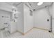 A clean white bathroom with a new sink and black fixtures at 264 S Newark Cir, Aurora, CO 80012