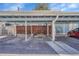 Assigned parking area for townhome complex with covered structure at 264 S Newark Cir, Aurora, CO 80012