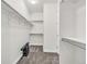 Walk-in closet with shelving, providing ample storage space at 8772 S Sicily Ct, Aurora, CO 80016