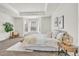 Spacious bedroom with tray ceiling, lots of natural light, and neutral decor at 8772 S Sicily Ct, Aurora, CO 80016