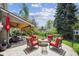 Inviting backyard patio with a cozy fire pit and comfortable seating, perfect for outdoor entertaining at 5225 S Everett Ct, Littleton, CO 80123