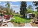 Well-maintained backyard featuring a shed and manicured lawn, perfect for relaxation and outdoor activities at 5225 S Everett Ct, Littleton, CO 80123