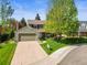 Charming home featuring a well-manicured lawn, mature tree, and inviting curb appeal at 5225 S Everett Ct, Littleton, CO 80123