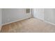 Neutral bedroom features cozy carpet, window and large closet at 2174 Alyssa St, Fort Lupton, CO 80621