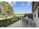 The spacious deck offers outdoor seating with a scenic view at 4231 W Ponds Cir, Littleton, CO 80123