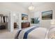 This bedroom features a closet and ensuite bathroom, allowing for private comfort at 10488 Bluffmont Dr, Lone Tree, CO 80124