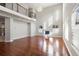 Bright, spacious living room featuring high ceilings and a decorative chandelier at 10488 Bluffmont Dr, Lone Tree, CO 80124