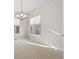 Cozy living room with natural light, featuring modern finishes at 10488 Bluffmont Dr, Lone Tree, CO 80124