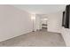 Spacious bedroom features plush carpeting, fresh paint, and an entrance to the bathroom at 6388 Oak Ct # 104, Arvada, CO 80004